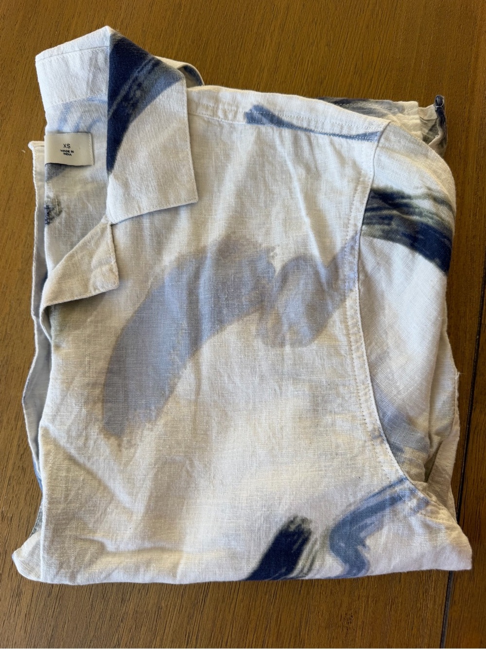 Hollister White Shirt with Blue Brushstroke Accents